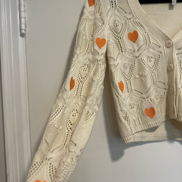 Blue Steel Medium Cream Open Knit Button cardigan w/ Orange Embroidered Hearts. - Picture 9 of 11